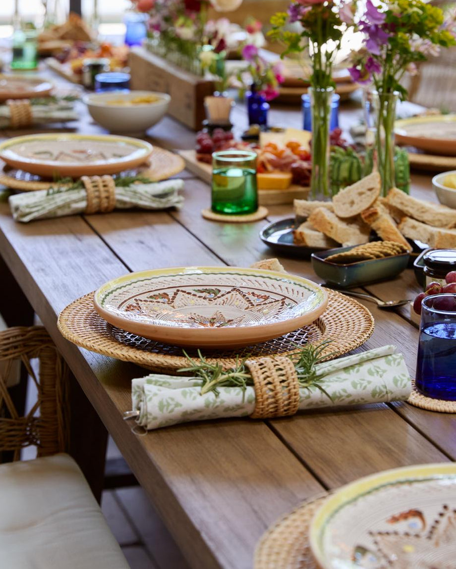 Thalassa Plate Charger with a Marlow Rattan Napkin Ring, handwoven rattan