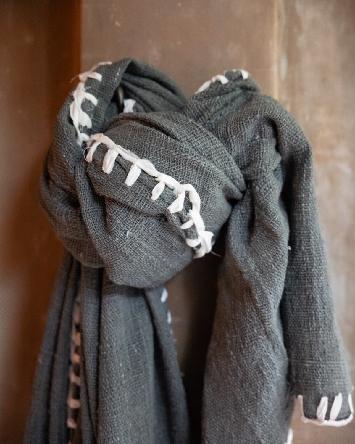 Raw Cotton Hand Woven Throw in Charcoal, made from hand-spun cotton
